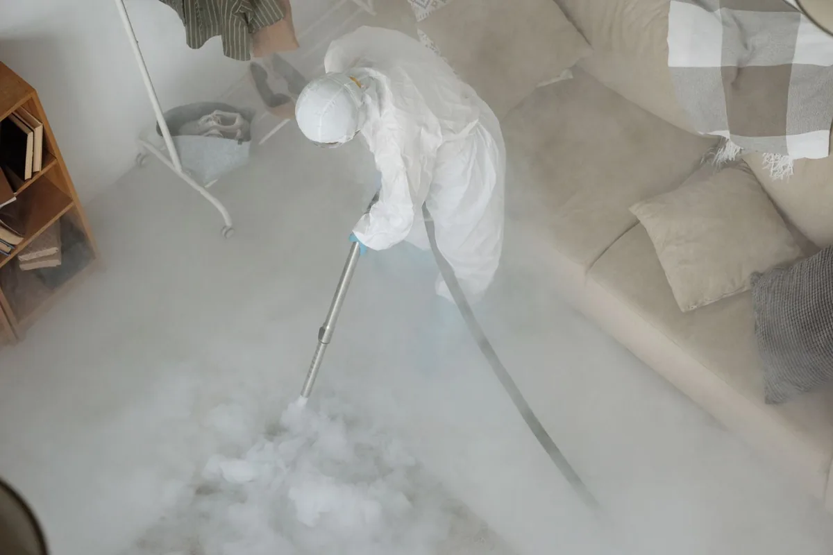 Biohazard cleanup technician in protective equipment, Alum Rock, CA
